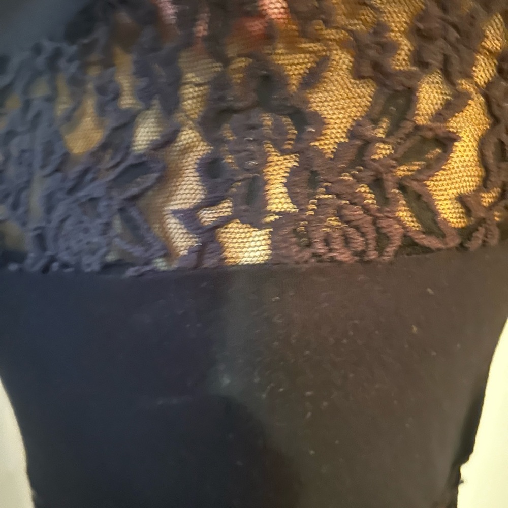 Guess.. see-through blacktop worn,no stains no rips no tears.